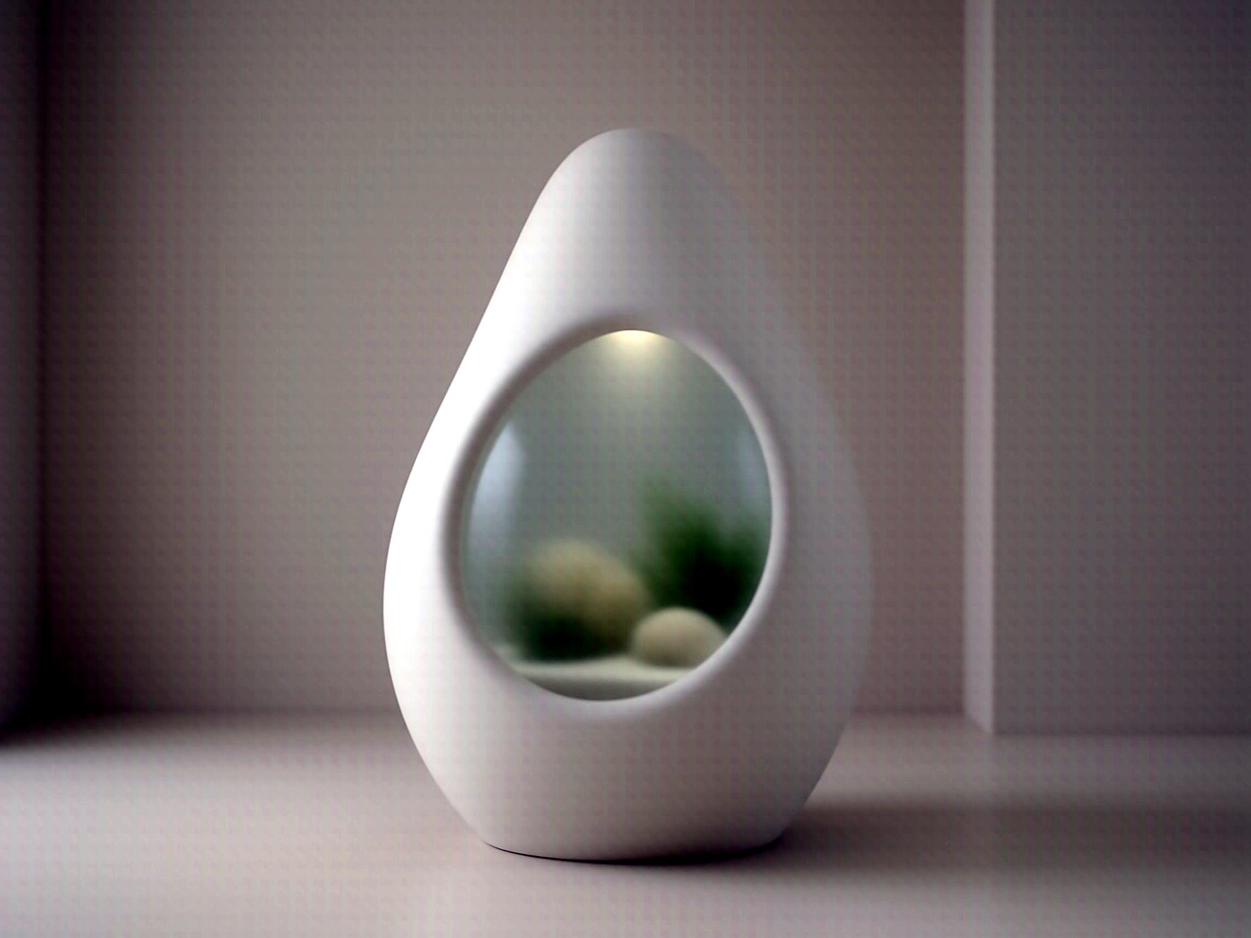 Chalk-white rock-shaped fiberglass aquarium glowing from within