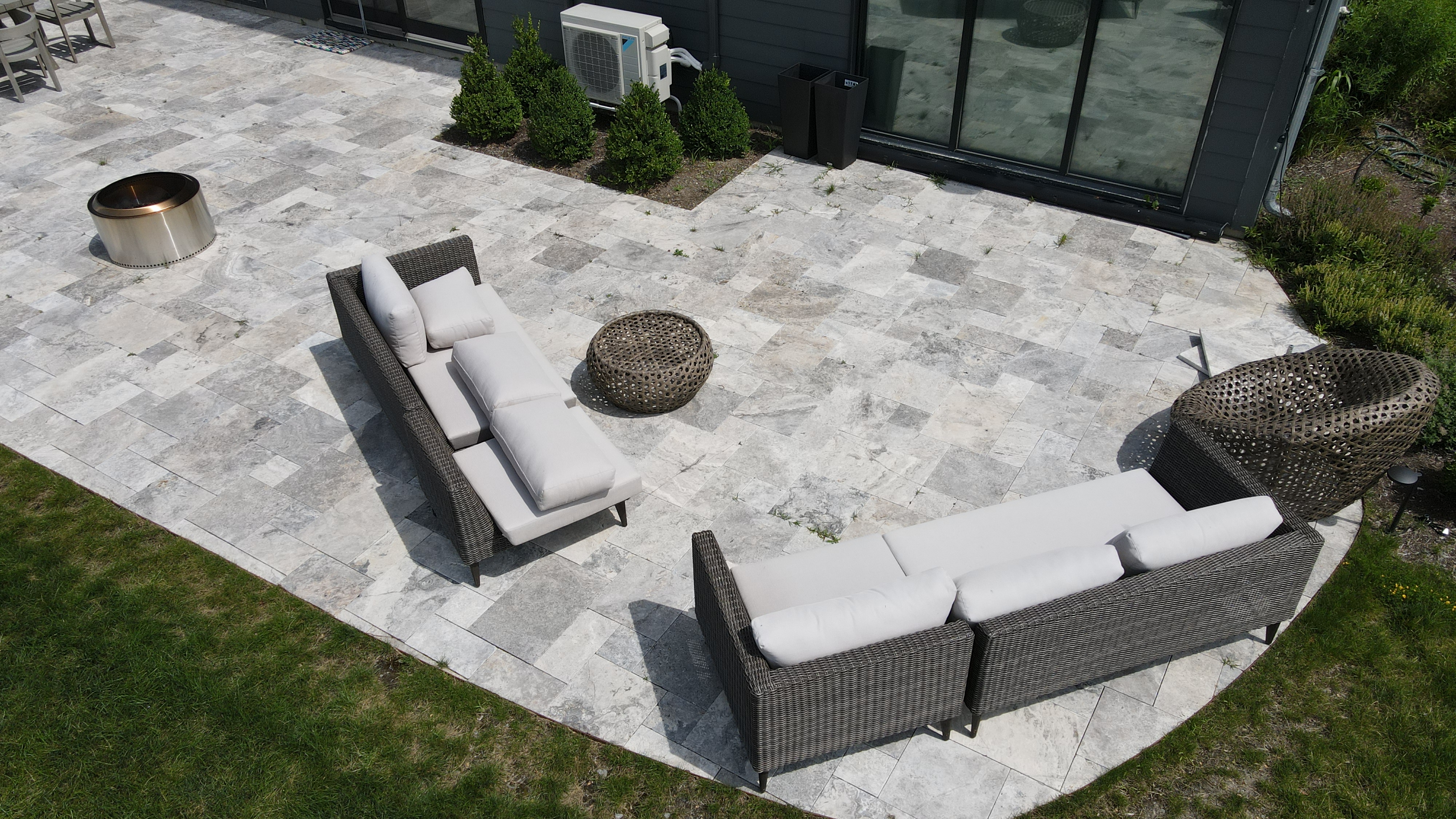 silver tumbled travertine blending light to dark greys with 